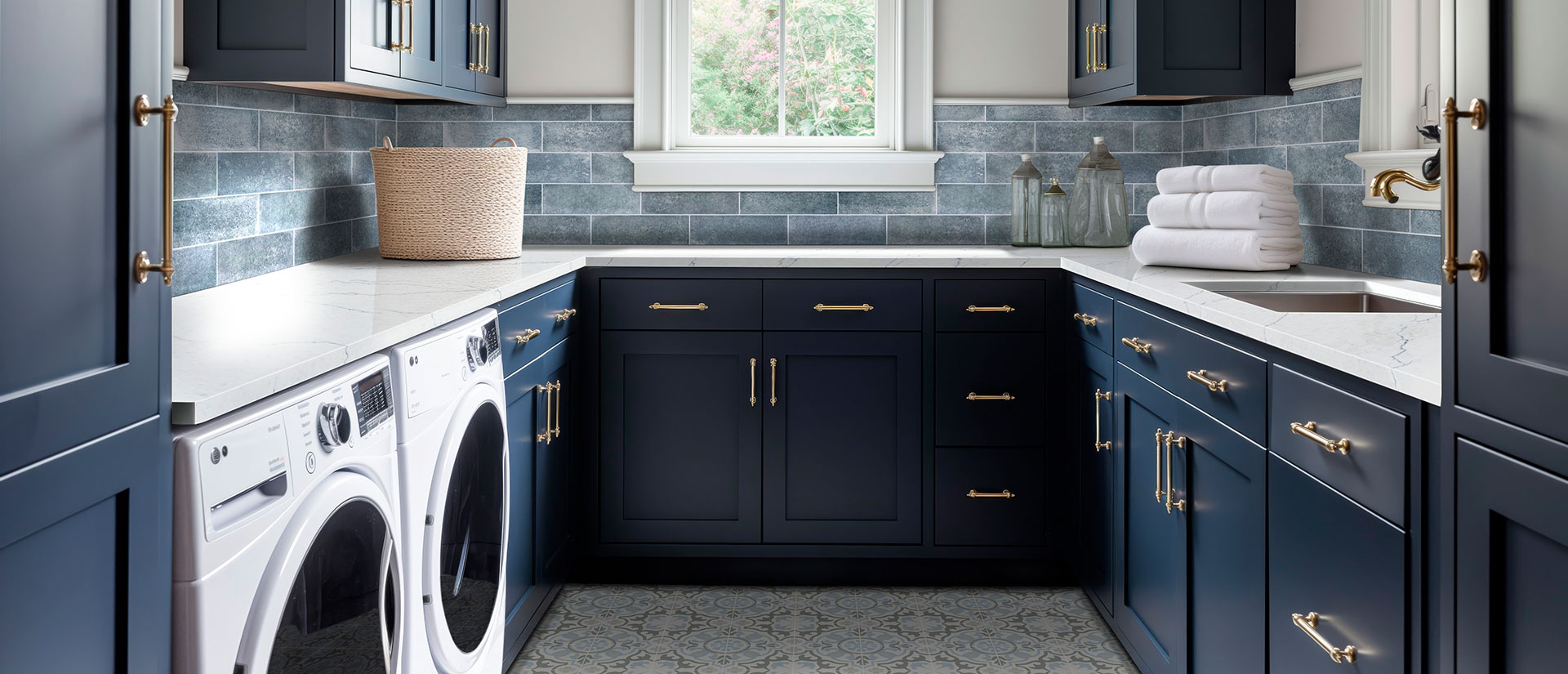 Custom cabinet storage area that can support mudroom and laundry room planning