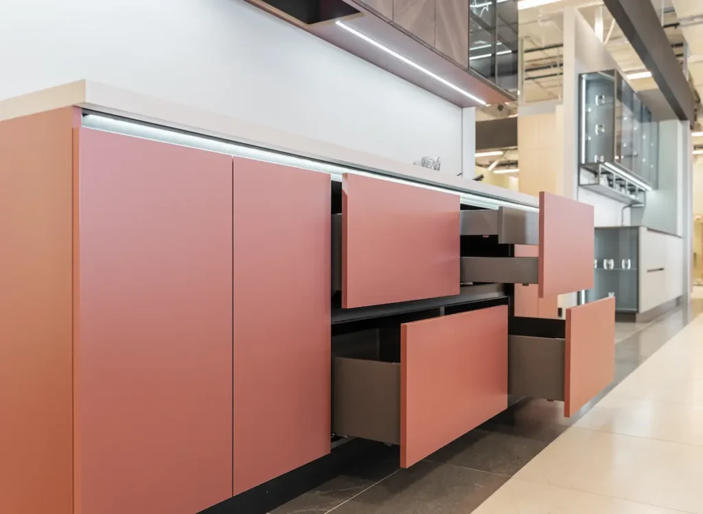 pink color frameless cabinets