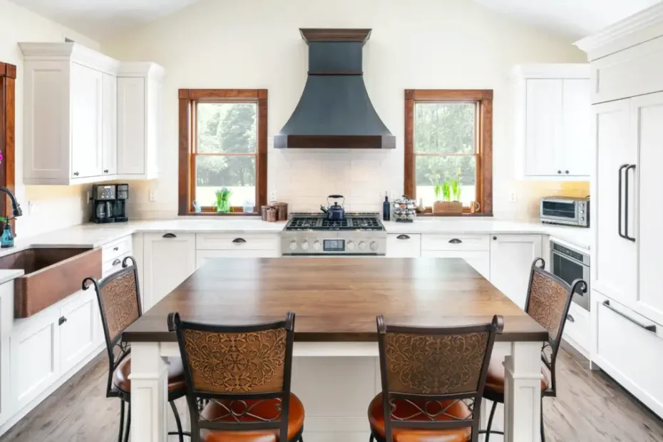 white kitchen cabinets with brown table